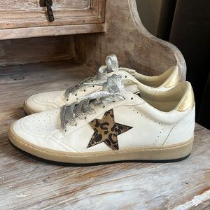 SOLD - ShuShop | Paz sneakers size 7.5 leopard / white / gold / silver star